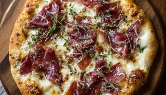 Delicious White Pizza Beef Prosciutto Hot Honey Magic